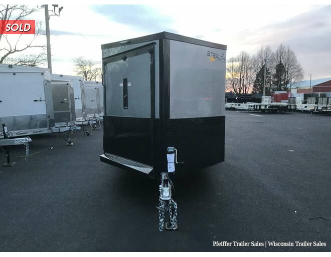 2022 7x23 Stealth Predator 3 Place Snowmobile Trailer, 6' Interior Height, Black Out Pkg Silver/Charcoal Snowmobile Trailer at Pfeiffer Trailer Sales STOCK# 92155 Exterior Photo