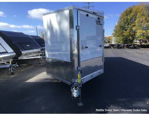 2023 7x29 Look Avalanche Deluxe 4 Place Snowmobile Trailer-White Ceiling, 6'6 Int. Height (White/Silver) Snowmobile Trailer at Pfeiffer Trailer Sales STOCK# 81474 Exterior Photo